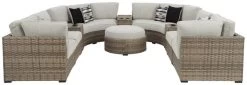 Signature Design By Ashley® Calworth 9-Piece Beige Outdoor Sectional